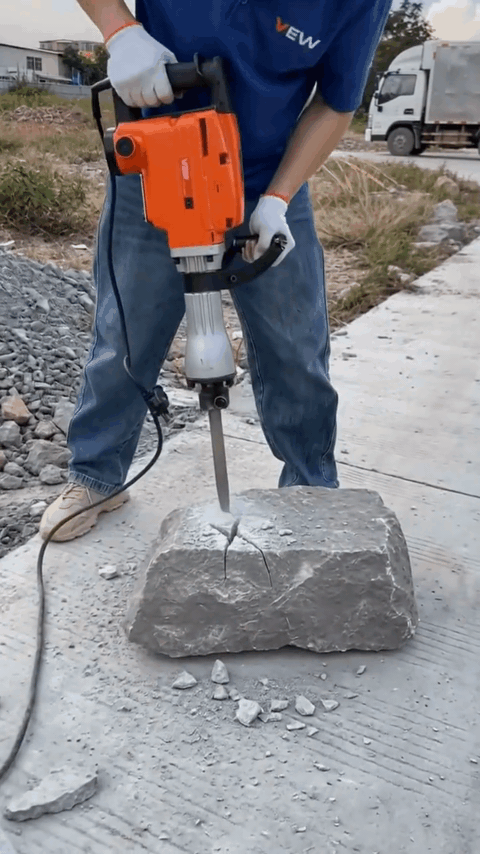FITO TerraBreaker demolition hammer chewing through a driveway